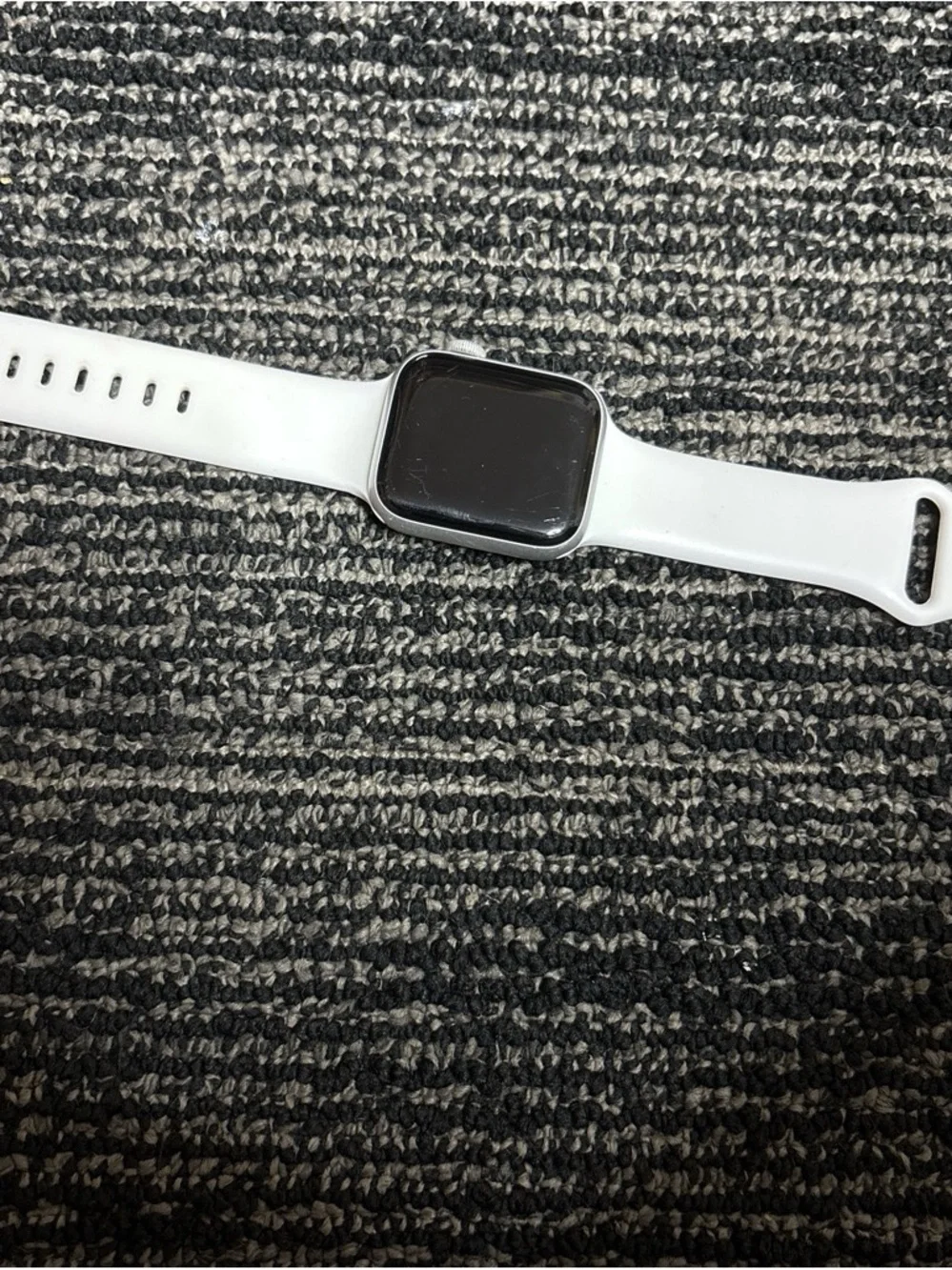 Apple Smartwatch with White Band and Silver Case